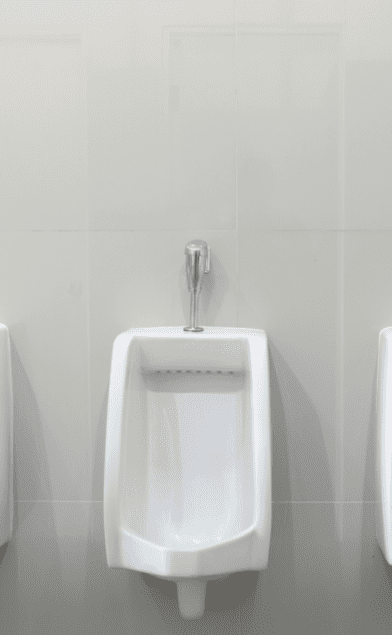 clean urinal in public bathroom